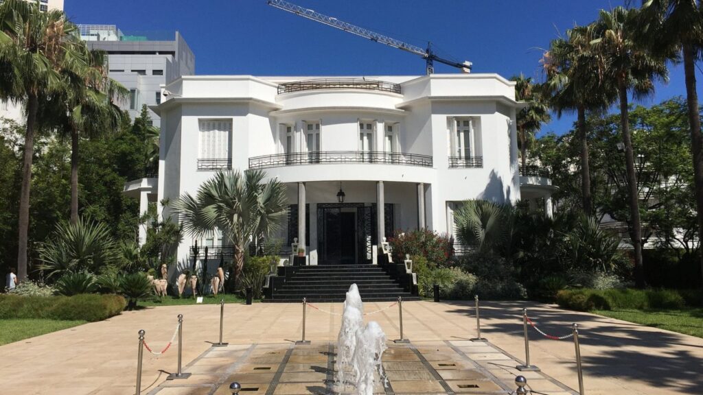Art Deco building facade with ornate balconies and geometric details on Boulevard Mohammed V, Casablanca, Morocco
