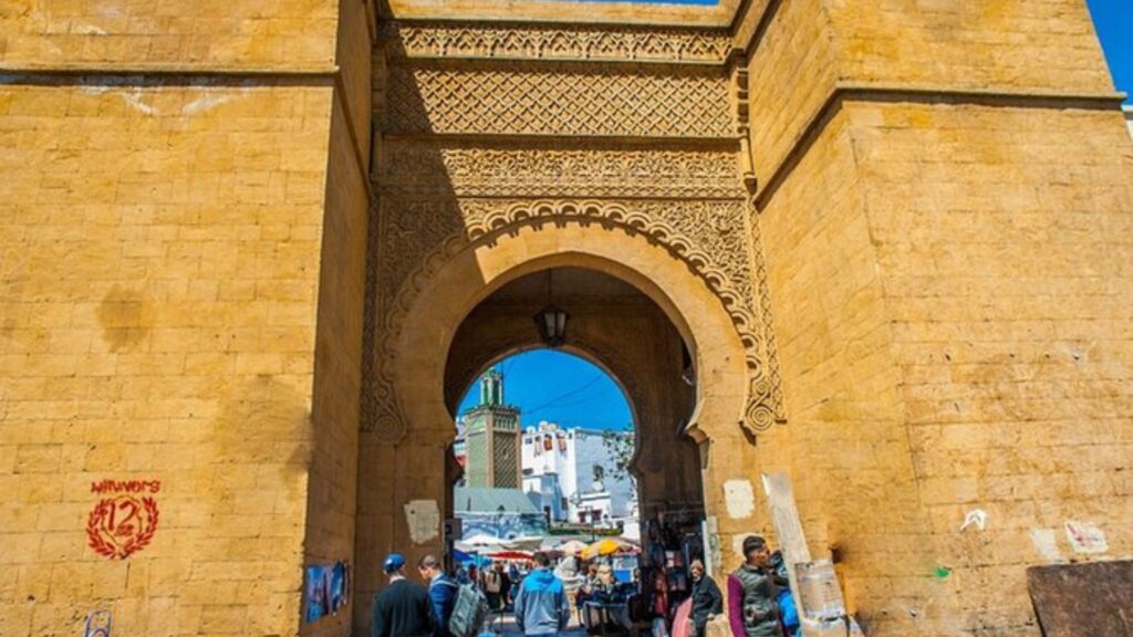 Old Medina alleyway in Casablanca with traditional Moroccan architecture and market stalls