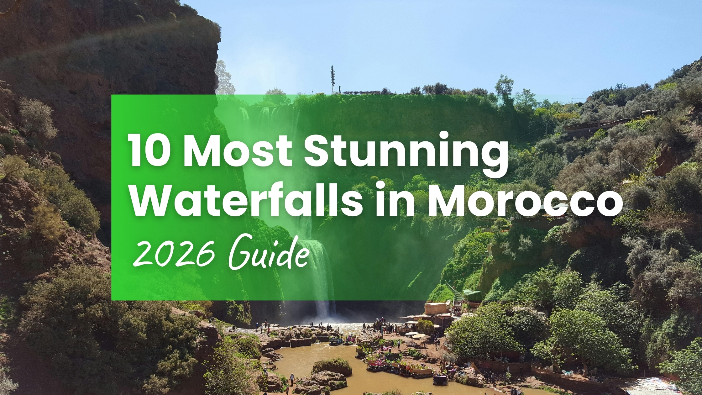 Aerial view of Cascades d'Ouzoud waterfall dropping into river gorge surrounded by lush cliffs — 10 most stunning waterfalls in Morocco
