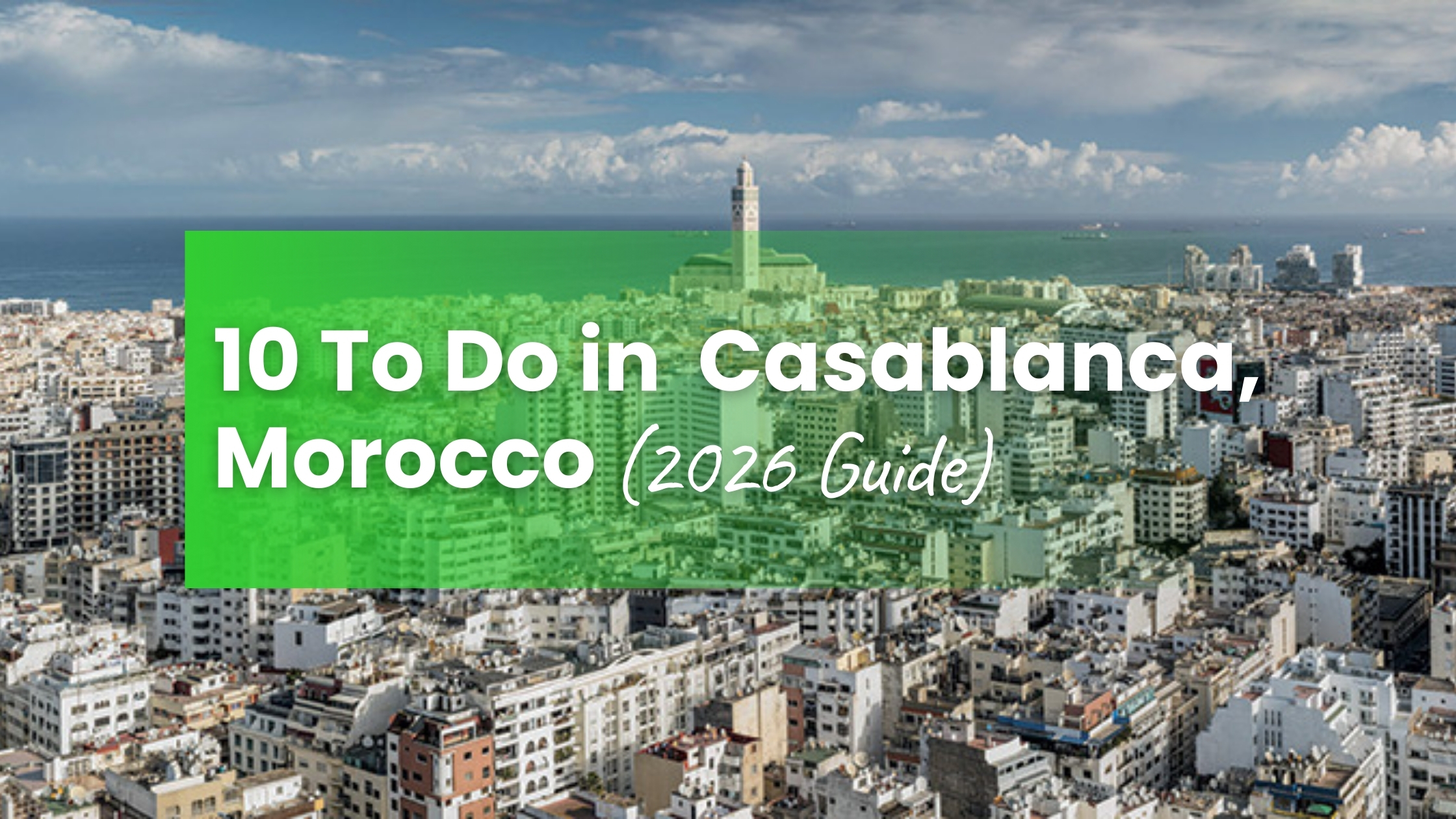 What to do in Casablanca Morocco — aerial cityscape with Hassan II Mosque minaret and the Atlantic Ocean